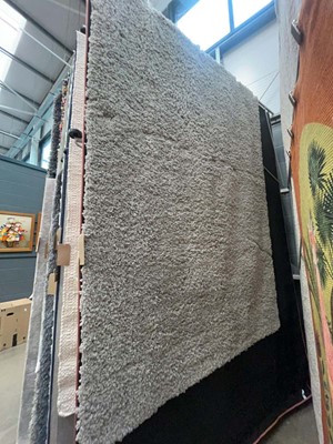 Lot 5028 - Large bobble styled rug in grey