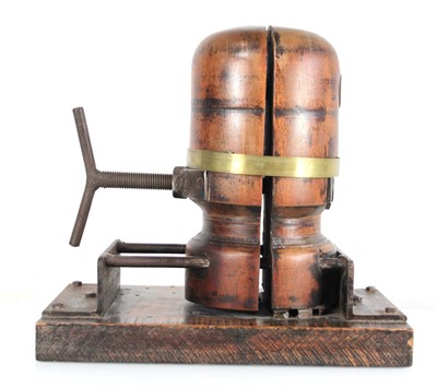 Lot 50 - A wooden adjustable hat stretcher on stand, w....