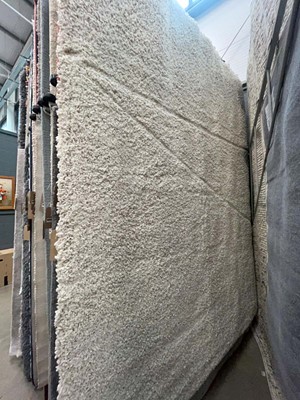 Lot 5041 - Large modern off white bobble style rug