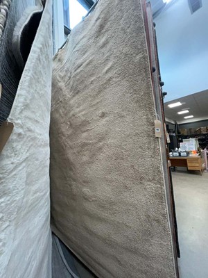 Lot 5052 - Large modern rug in beige