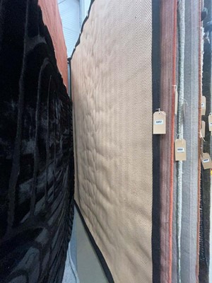 Lot 5057 - Large herringbone patterned rug with black border
