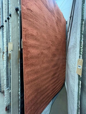 Lot 5058 - Large modern rug in rusty orange colour