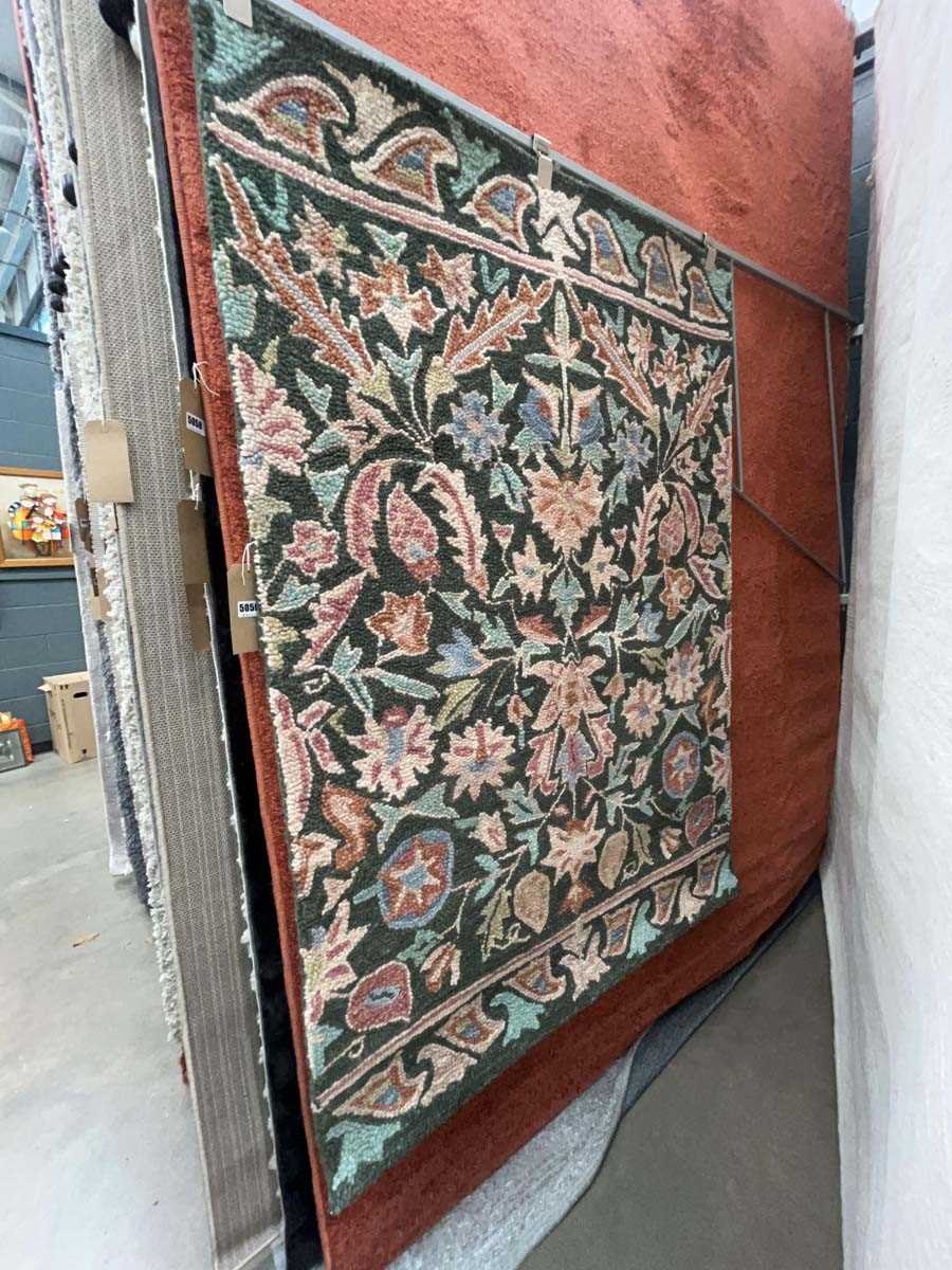 Lot 5059 - Small multi coloured rug with leaf decoration