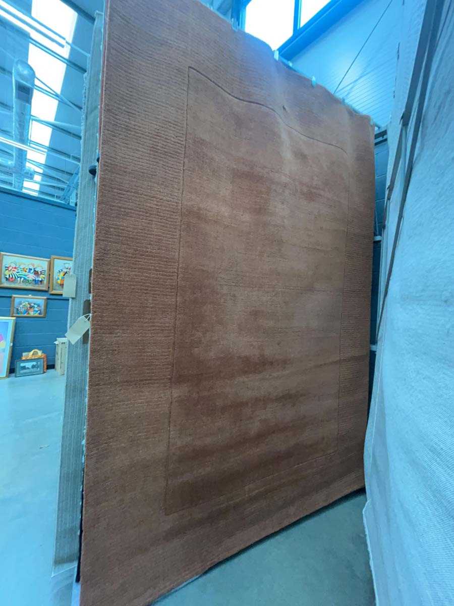 Lot 5061 - Large modern rug in brown
