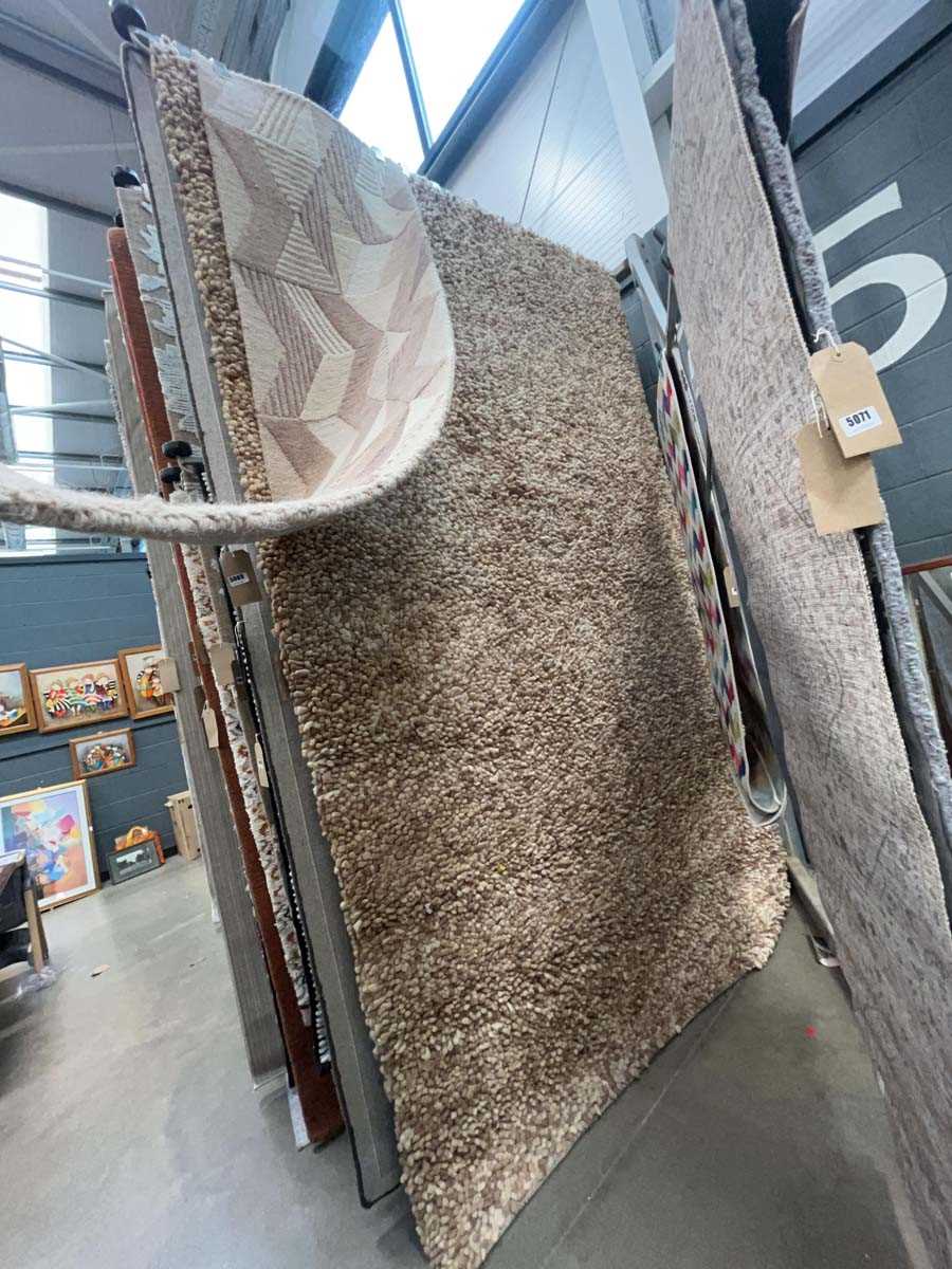 Lot 5068 - Large modern bobble style rug in brown