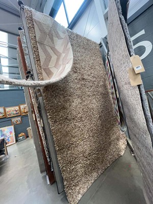 Lot 5068 - Large modern bobble style rug in brown