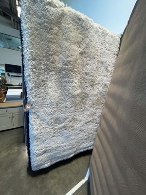 Lot 1303 - White shag pile rug, approx. 160 x 230cm.
