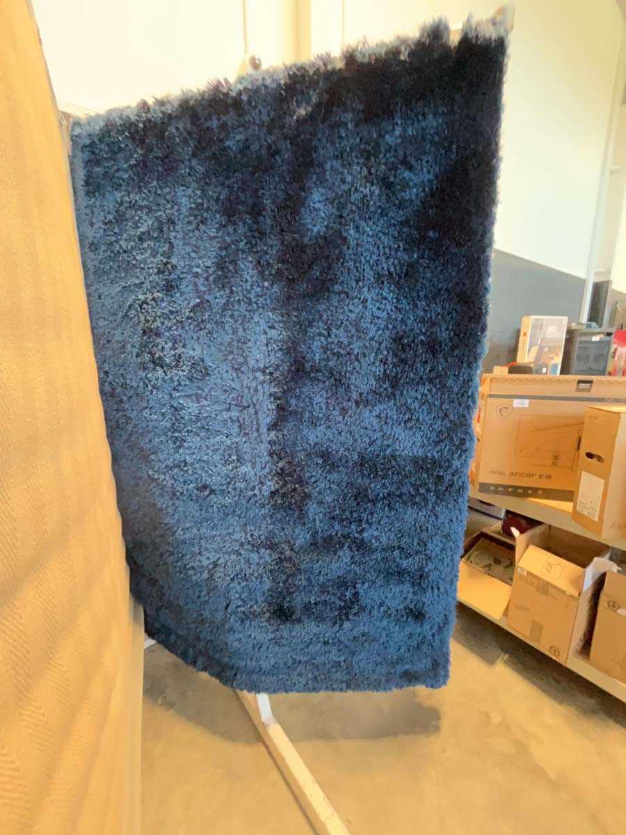 Lot 1304 - Blue shag pile rug, approx. size 160 x 230cm.