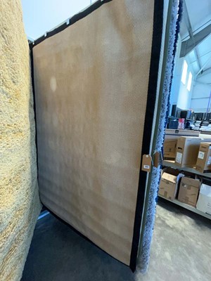 Lot 1312 - Natural fibre rubber backed area rug with...