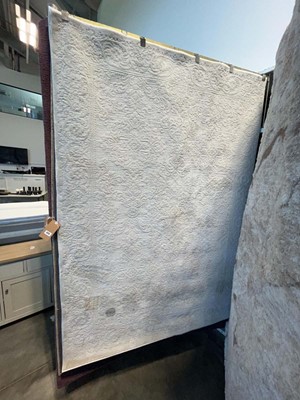 Lot 1315 - Patterned white area rug, approx. size 160 x...