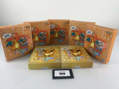 Lot 1343 - (7) Pokémon TCG Chinese Eevee/Charizard Card...