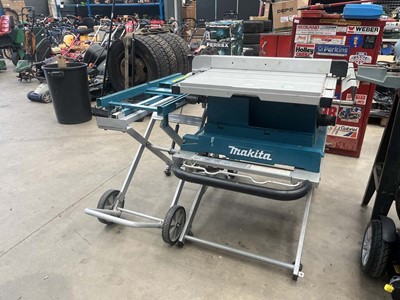 Lot 4517 - Makita table saw plus stand and Makita...