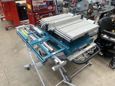 Lot 4517 - Makita table saw plus stand and Makita...