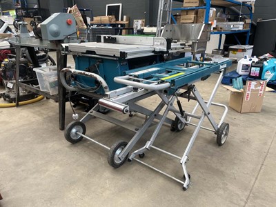 Lot 4517 - Makita table saw plus stand and Makita...