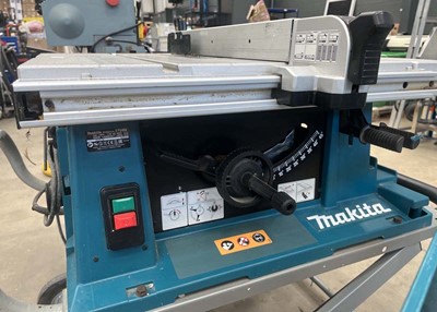 Lot 4517 - Makita table saw plus stand and Makita...