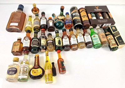 Lot 155 - A collection of 33 small bottles & miniatures...