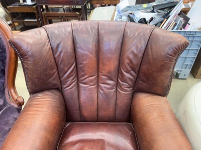 Lot 5345 - Leather armchair on ball and claw supports