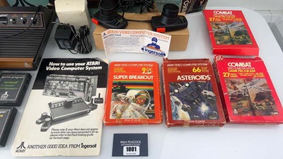 Lot 1001 - Atari 2600 in box together with 8 game cartridges