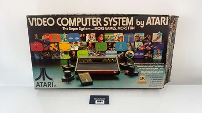 Lot 1001 - Atari 2600 in box together with 8 game cartridges