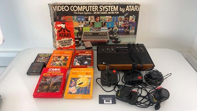 Lot 1002 - Atari 2600 in box together with 5 game cartridges