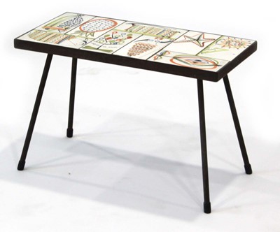 Lot 59 - A 1950/60's occasional table, the surface set...
