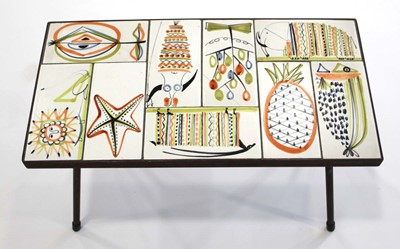 Lot 59 - A 1950/60's occasional table, the surface set...