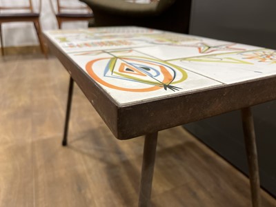 Lot 59 - A 1950/60's occasional table, the surface set...