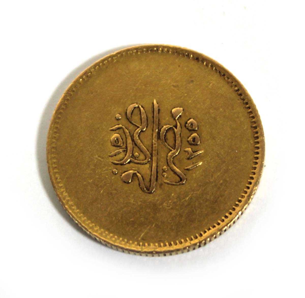 Lot 405 - An Egyptian yellow metal coin, 8.4 gms