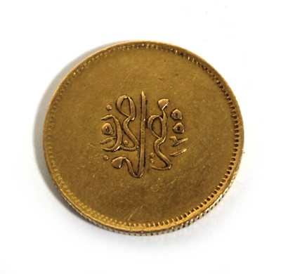 Lot 405 - An Egyptian yellow metal coin, 8.4 gms