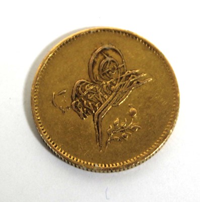 Lot 405 - An Egyptian yellow metal coin, 8.4 gms
