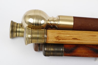 Lot 1033 - Five various brass-mounted 'Tippling' or...