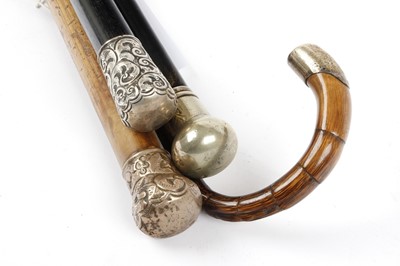 Lot 1037 - Four various silver and white-metal mounted...