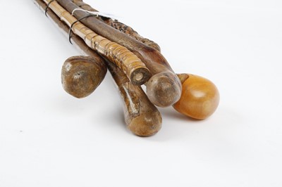 Lot 1043 - Six various vintage walking sticks,...