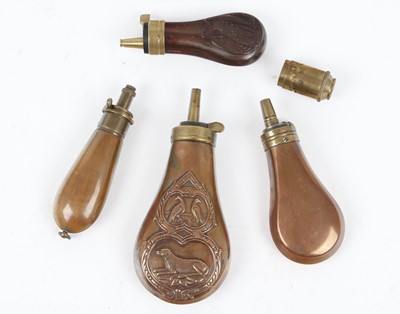 Lot 1044 - Four small copper and brass powder flasks, inc....
