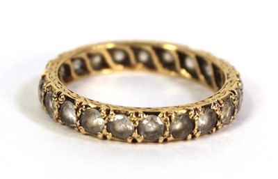 Lot 506 - A yellow metal full eternity ring set paste,...