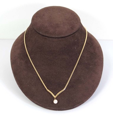 Lot 507 - A 9ct yellow gold flatlink necklace of...