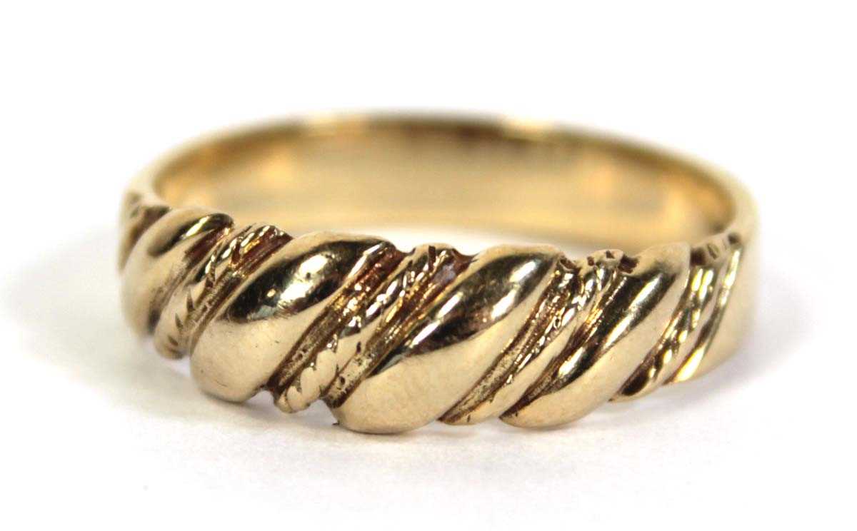 Lot 509 - A 9ct yellow gold keepers style ring, ring...
