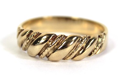 Lot 509 - A 9ct yellow gold keepers style ring, ring...