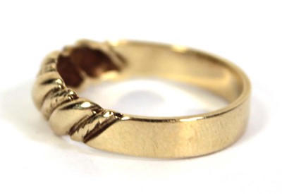 Lot 509 - A 9ct yellow gold keepers style ring, ring...