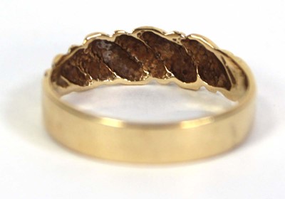 Lot 509 - A 9ct yellow gold keepers style ring, ring...