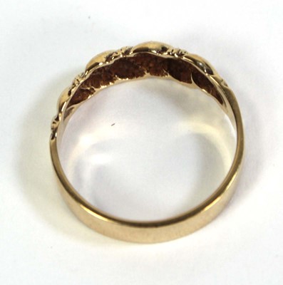 Lot 509 - A 9ct yellow gold keepers style ring, ring...