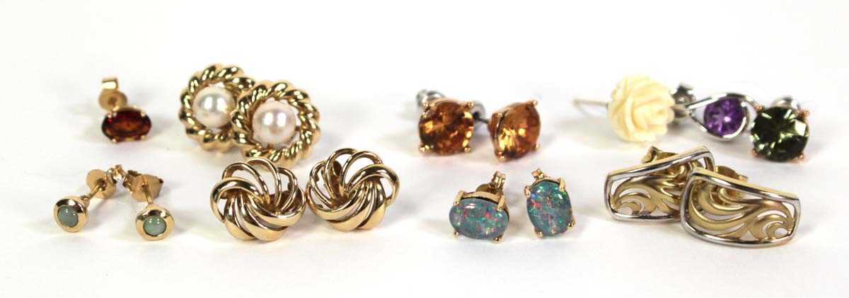 Lot 513 - Four pairs of 9ct yellow gold ear studs of...