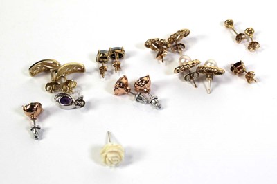 Lot 513 - Four pairs of 9ct yellow gold ear studs of...