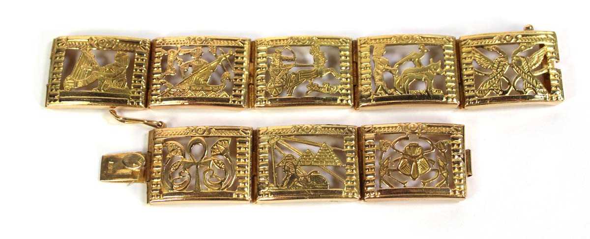 Lot 515 - An Egyptian yellow metal eight section...