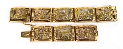 Lot 515 - An Egyptian yellow metal eight section...