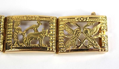 Lot 515 - An Egyptian yellow metal eight section...