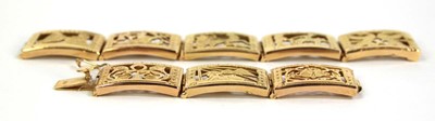 Lot 515 - An Egyptian yellow metal eight section...