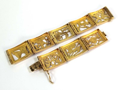 Lot 515 - An Egyptian yellow metal eight section...