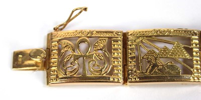 Lot 515 - An Egyptian yellow metal eight section...