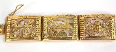 Lot 515 - An Egyptian yellow metal eight section...